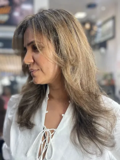 A beautiful example of an ash-toned color melt, where the highlights blend seamlessly into the base color.