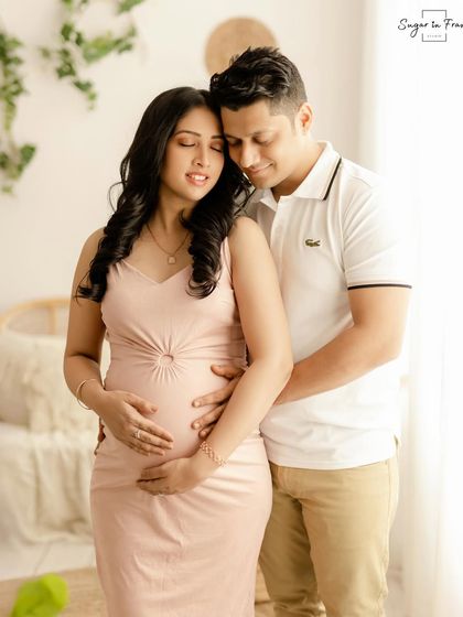 A loving embrace between parents-to-be during their maternity session. The focus is on their connection and the shared joy of expecting their new baby.