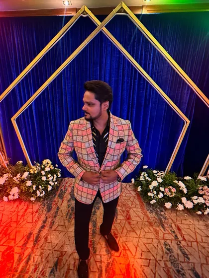 Ready to bring the vibe in a stylish checkered blazer. The right outfit helps in creating a strong first impression on stage.