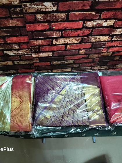 Here are three sarees, each pre-pleated and packed in clear covers. This keeps them neat and easy to identify in your wardrobe.