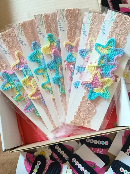 A big order of our pastel star newborn headbands, all ready to be packed. These are a favorite for return gifts at first birthday parties.