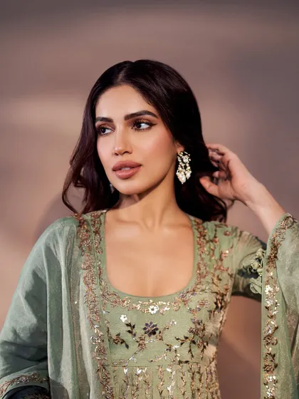 Bhumi Pednekar in a graceful sage green anarkali for the 'Pariksha Pe Charcha' event. The subtle sequin work and classic silhouette make it a sophisticated and event-appropriate choice.