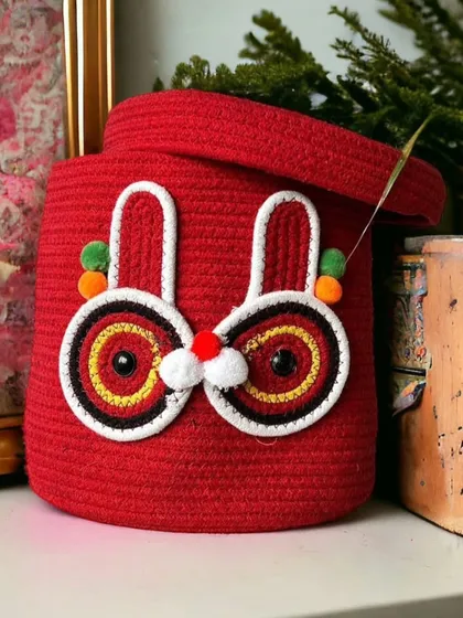 This bright red bunny basket is another fun and colorful option to say goodbye to clutter.