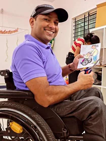 Our founder, Vishnu, getting hands-on with crafting. He believes in leading from the front and participating in every aspect of our volunteer activities.