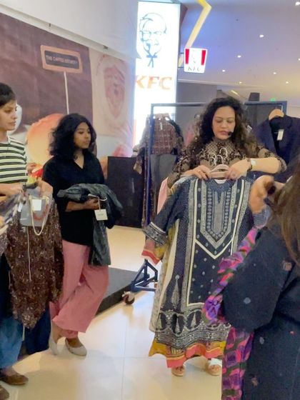 During a styling workshop at Bhartiya Mall, I curated outfits from various brands to demonstrate different looks. Here, I'm showing how to style a classic Indian kurta for a modern, elegant look.