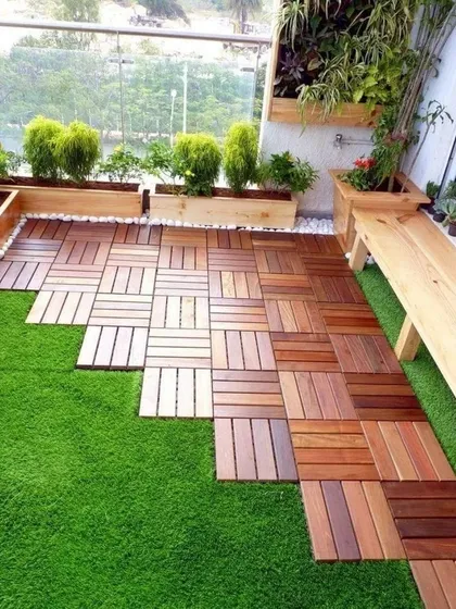 The perfect combination of low-maintenance artificial grass and warm wooden deck tiles. This popular balcony design offers a practical and beautiful space for relaxing, playing, or enjoying your morning coffee.