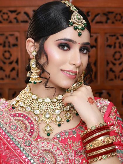 The final result of my student's hard work. A stunning, glamorous bride ready for her big day. This makes me a proud teacher.