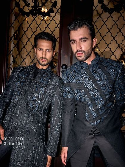 Refined chaos. The mirror embroidery and stormy threads on these black ensembles are for nights that are not meant to be quiet.