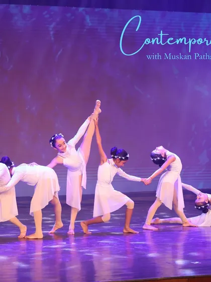 This is the moment it all comes together. Our young dancers showcase their grace, flexibility, and teamwork in a stunning contemporary performance, capturing the magic we create on stage.
