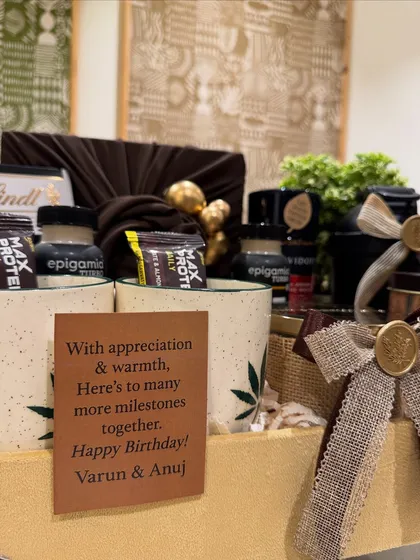 The personalized birthday card for Varun and Anuj reads, "With appreciation & warmth, here's to many more milestones together." It shows how we tailor our messages to reflect the relationship and occasion.