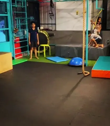 A glimpse into our Jayanagar academy, fully equipped with mats, ropes, and other gear to provide a complete gymnastics and calisthenics training experience for kids.