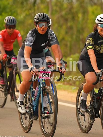 The women's peloton, with riders from various teams, enjoying the race.