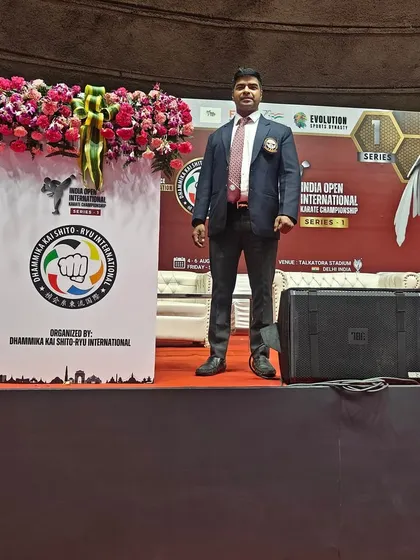 On stage at the India Open International Karate Championship. My presence at these events ensures my students have a direct line to national and international platforms.