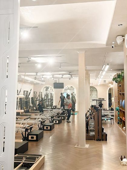 Our GK studio is a hub for both Pilates and boxing classes, offering a diverse fitness experience in a beautiful, open plan space.
