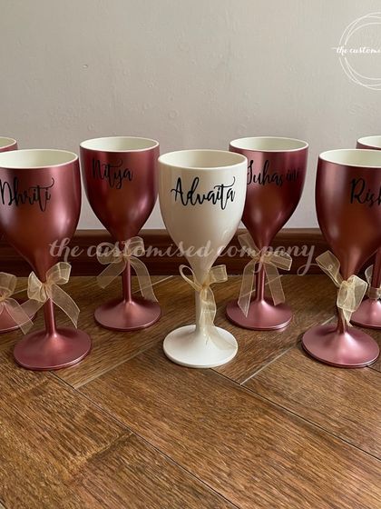 Unbreakable bonds deserve unbreakable glasses. These personalized rose gold and white wine goblets are a stylish and practical gift for your bridesmaids, perfect for poolside celebrations.