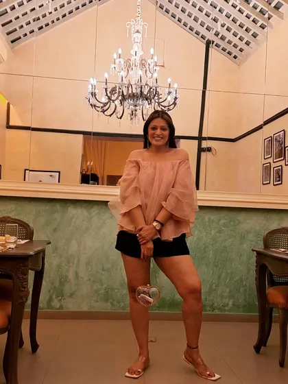 It's Goa, baby! A simple off-the-shoulder top and black shorts are all you need for a casual evening in the beach town.