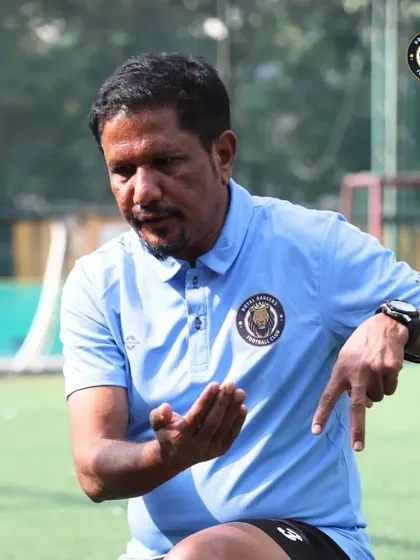 Coach Nathan Sir demonstrating a technique during a training session at The Winter Cup. Our coaches lead by example, actively participating in drills to show players the correct form.