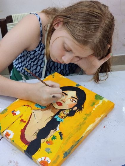 Follow along as a young student works diligently on her portrait painting, from the first outline to the final expressive details.