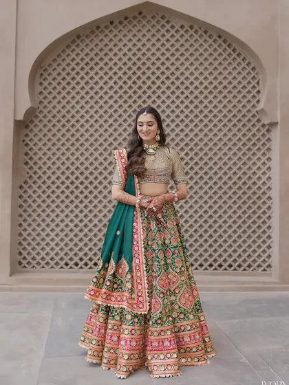 Another full-length shot of the bride, looking happy and radiant.