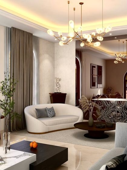 Muted tones meet natural warmth, and geometric chandeliers spark intrigue. This modern interior is crafted to perfection, with sculptural furniture and an intricately designed bar table.