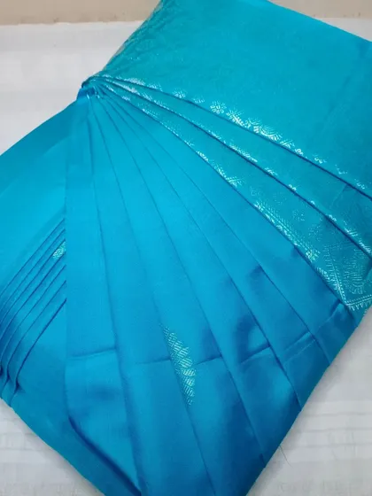 Your saree's rescue team is here. This sky-blue saree is now ready to be worn without any fuss.
