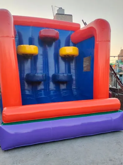 A compact inflatable climbing game, perfect for smaller spaces or indoor events. It's a fun challenge for kids to race to the top.