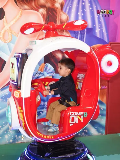 A little pilot takes control in one of our fun kiddie rides. These gentle rides are perfect for our youngest guests to enjoy safely.