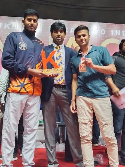 Honoring one of our senior players for his performance at the India Open International.