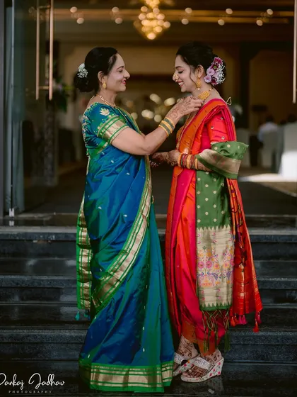 A mother's love as she helps her daughter with her necklace. This quiet, emotional moment between Zaee and her mother is a precious memory from her engagement day in Pune.