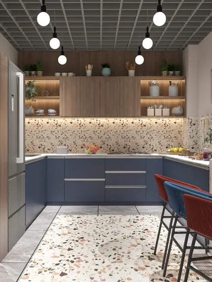 For this factory office cafeteria, we used a bold and modern design. The space features a mix of terrazzo, a striking blue and red color scheme, and an industrial grid ceiling to create a vibrant and energetic place for employees to relax.