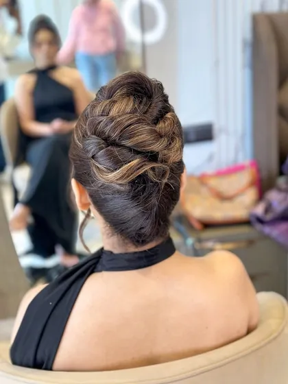 A behind-the-scenes shot of the topknot, showing the beautiful highlights and lowlights in the hair.