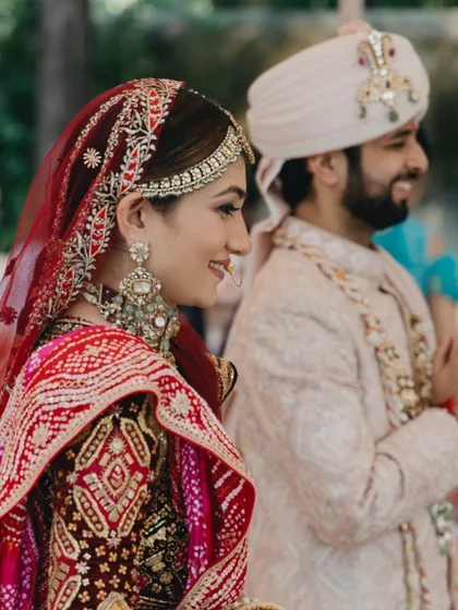 A beautiful side profile of the couple during their wedding rituals, looking content and blessed.