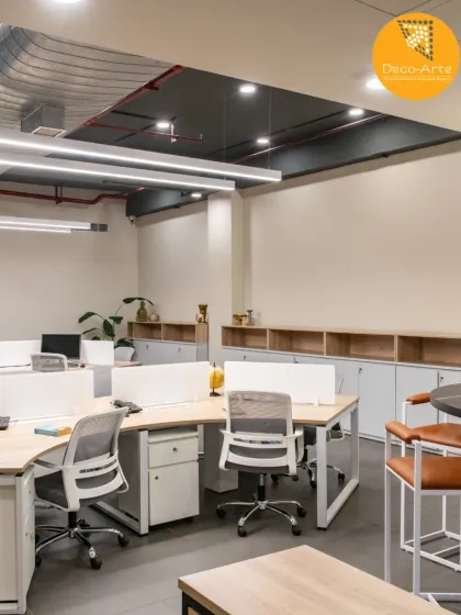 At Brandman, productivity meets purpose. This view showcases the clean lines, calm tones, and clutter-free design of the workstations, all crafted for the modern professional mind.