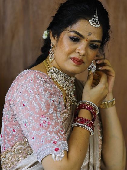 This is a close-up of the custom blouse I designed for my housewarming. It’s a velvet base with incredibly detailed hand embroidery using silver zardozi, pearls, and sequins. Every stitch was carefully planned to create this stunning, personal piece.