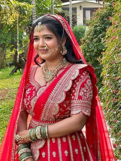 The bride's serene expression is perfectly complemented by the soft, glowing makeup. This look is ideal for outdoor or daytime ceremonies, providing a fresh and radiant finish.