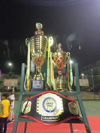The spoils of war. The IAKO Pro Champion Title Belt and team trophies, earned through the hard work of our entire squad.