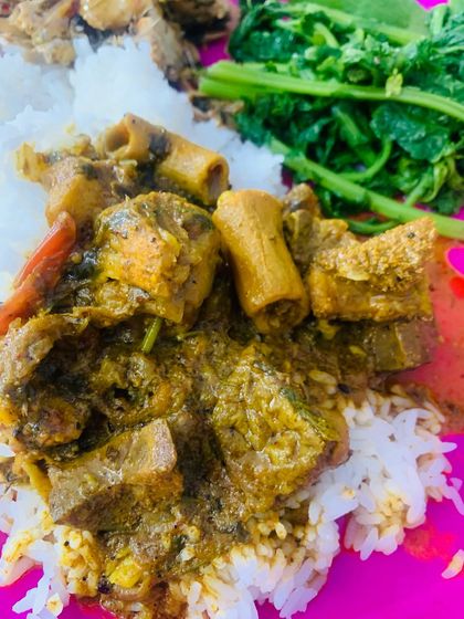 A close-up of the beef innard curry on the plate.