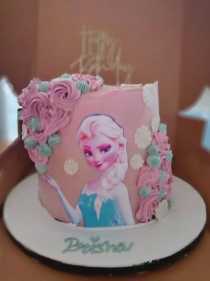 A lovely pink version of our Frozen cake. This custom design shows how we can adapt popular themes to a child's favorite colors.