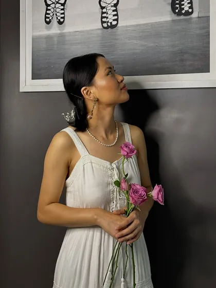 Another shot of the soft and romantic makeup look, showcasing the subtle definition and fresh-faced appeal.