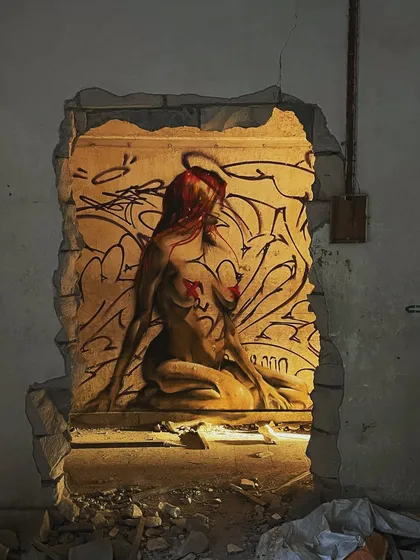A different shot of the "Views" piece, with the light hitting it just right. The combination of the figure and the graffiti creates a powerful image of womanhood and the street.