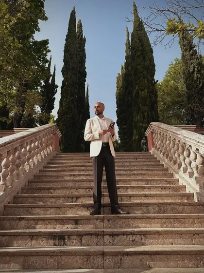 Posing on the grand staircase of the Anantara Resort in Marbella, Spain. This venue was the perfect setting for a beautiful multi-day, cross-cultural wedding.