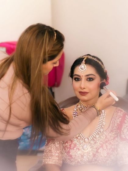 A rare moment where the photographer captured me in action. I'm usually behind the camera, but it's nice to have these candid shots with my beautiful bride.