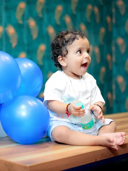 That look of pure excitement. I always aim to capture these candid, unposed expressions that show a child's true personality during a shoot.