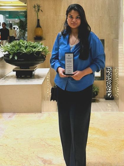 Feeling proud and grateful after the awards ceremony. This recognition fuels my passion to continue creating spaces that people love.