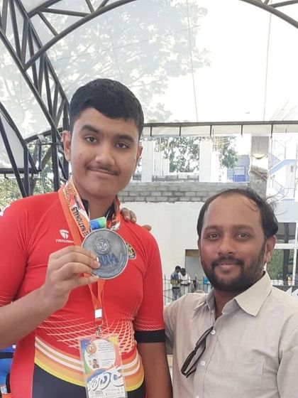 Shubham showing his hard-earned silver medal from the 60th National Championships.