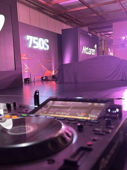 A view from my console at the McLaren launch event. Professionalism and the right musical selection are key to creating the perfect atmosphere for corporate clients.