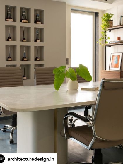 The conference room at Office G-2 is designed to be bright and inspiring, with ample natural light, ergonomic seating, and clean lines that promote a productive atmosphere.