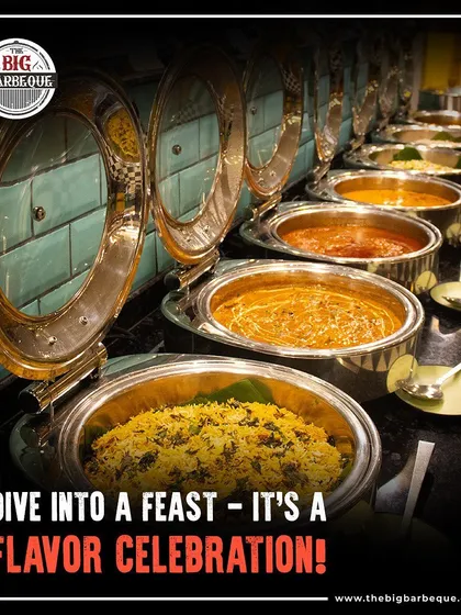 Dive into a flavor celebration. This is a look at our main course buffet line, featuring a variety of vegetarian and non-vegetarian curries, biryanis, and rice dishes.
