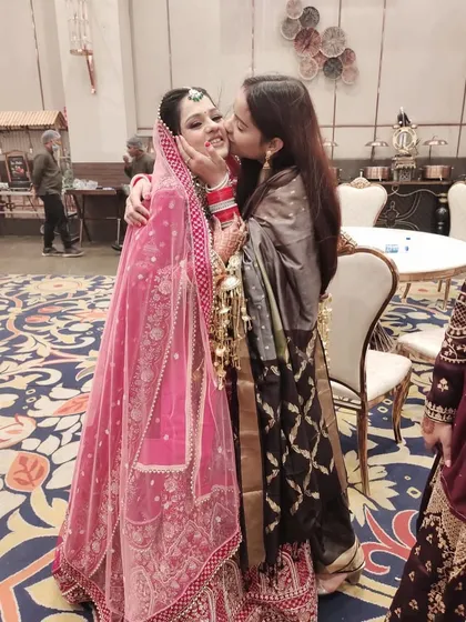 A sweet kiss for the bride.