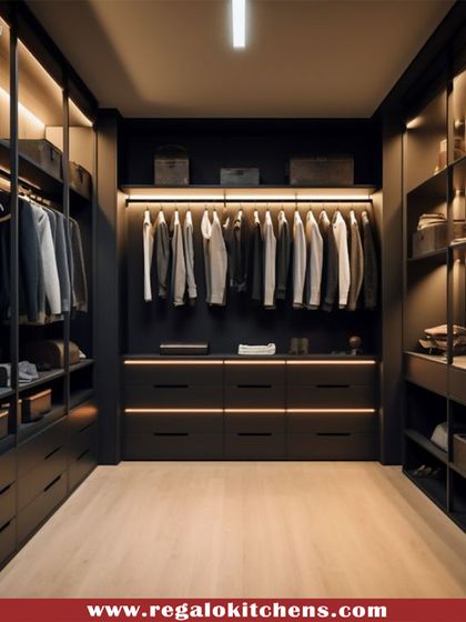 This all-black walk-in closet makes a powerful statement. We used integrated shelf lighting to create contrast and ensure every item is visible, proving that dark tones can feel both spacious and luxurious.